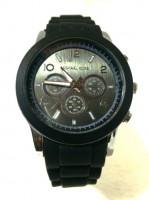 MICHAEL KORS NEGRO PULSO GOMA  CON PLATEADO